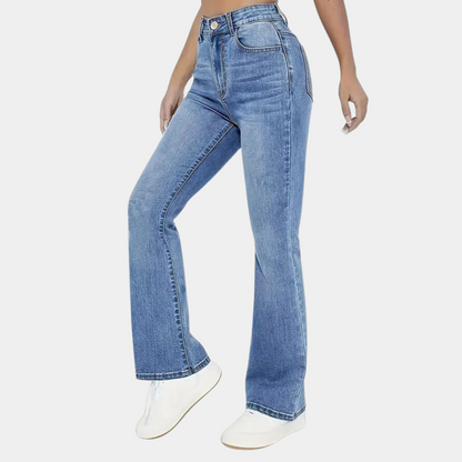 Blue jeans worn by a person on a white background