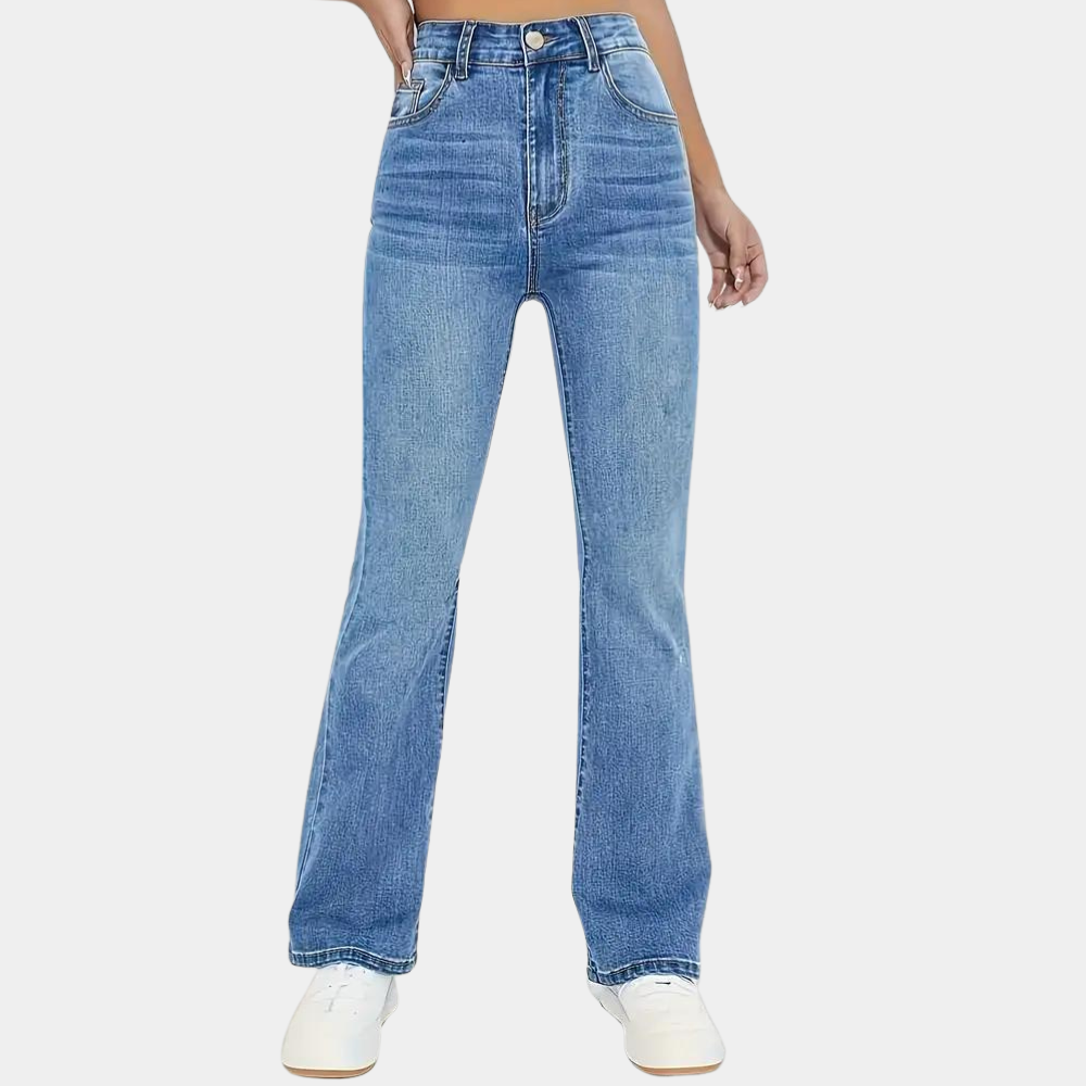 Blue jeans worn by a person on a white background