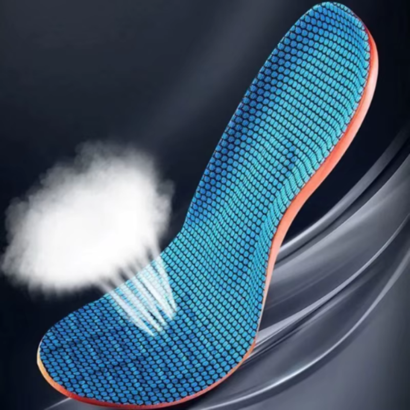 Blue shoe insole with a white cloud-like substance on a dark background