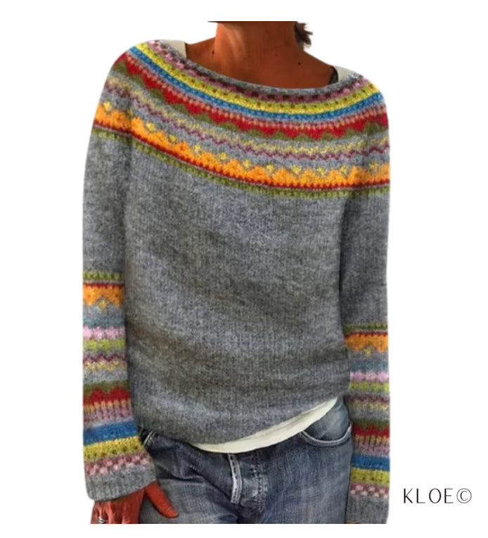 Gray sweater with colorful patterned sleeves and neckline on a white background, brand 'KLOE' visible.