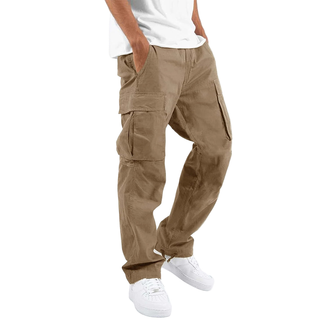 Person wearing beige cargo pants on a white background
