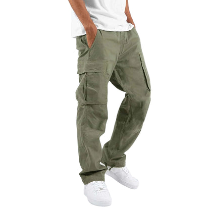 Person wearing olive green cargo pants on a white background