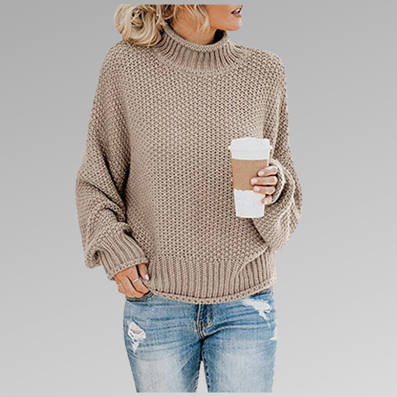 Woman in beige knit sweater with coffee mug, casual fashion, autumn outfit.